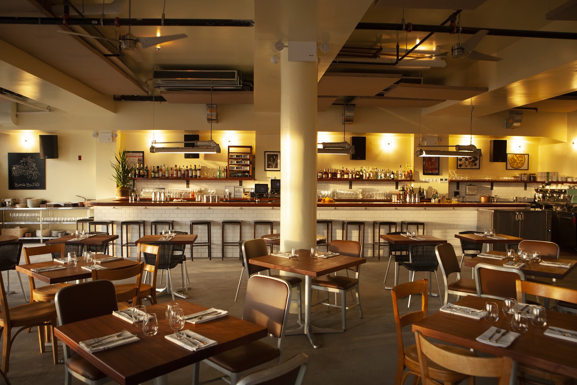 Barbuto dining room and bar set for service